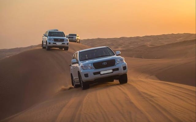 private-early-morning-sunrise-view-safari-with-sand-boarding-and-dune-bashing_1
